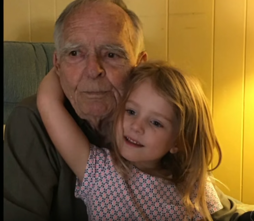 Young girl is angel to old man