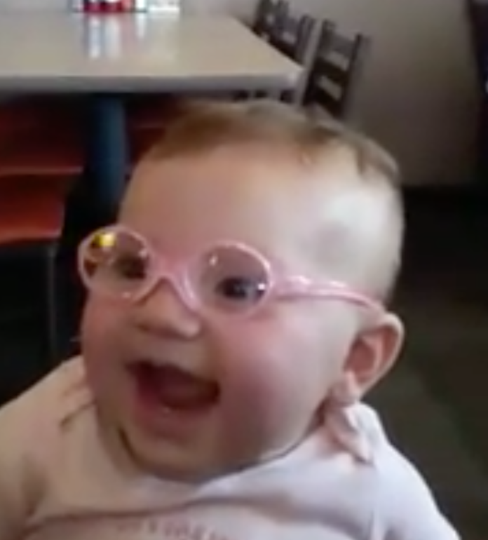 Baby Smiles with new glasses